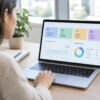 A digital marketer reviews organized subscriber groups and email campaign data on a laptop.